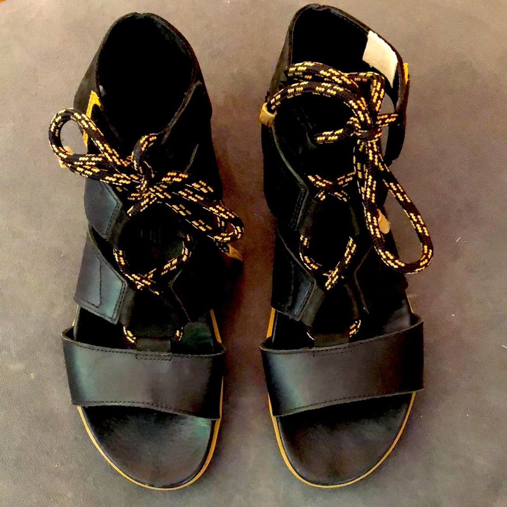 Sorel black gladiator sandals. Torpeda lace